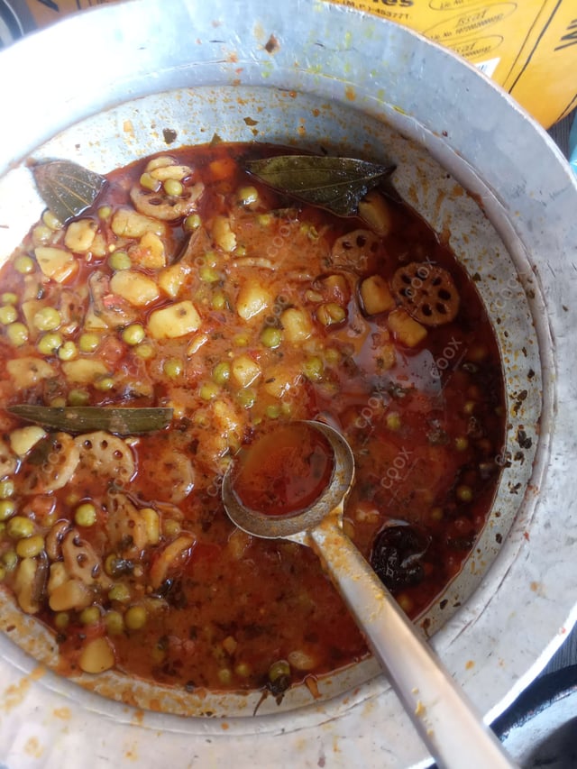 Delicious Aloo Matar prepared by COOX