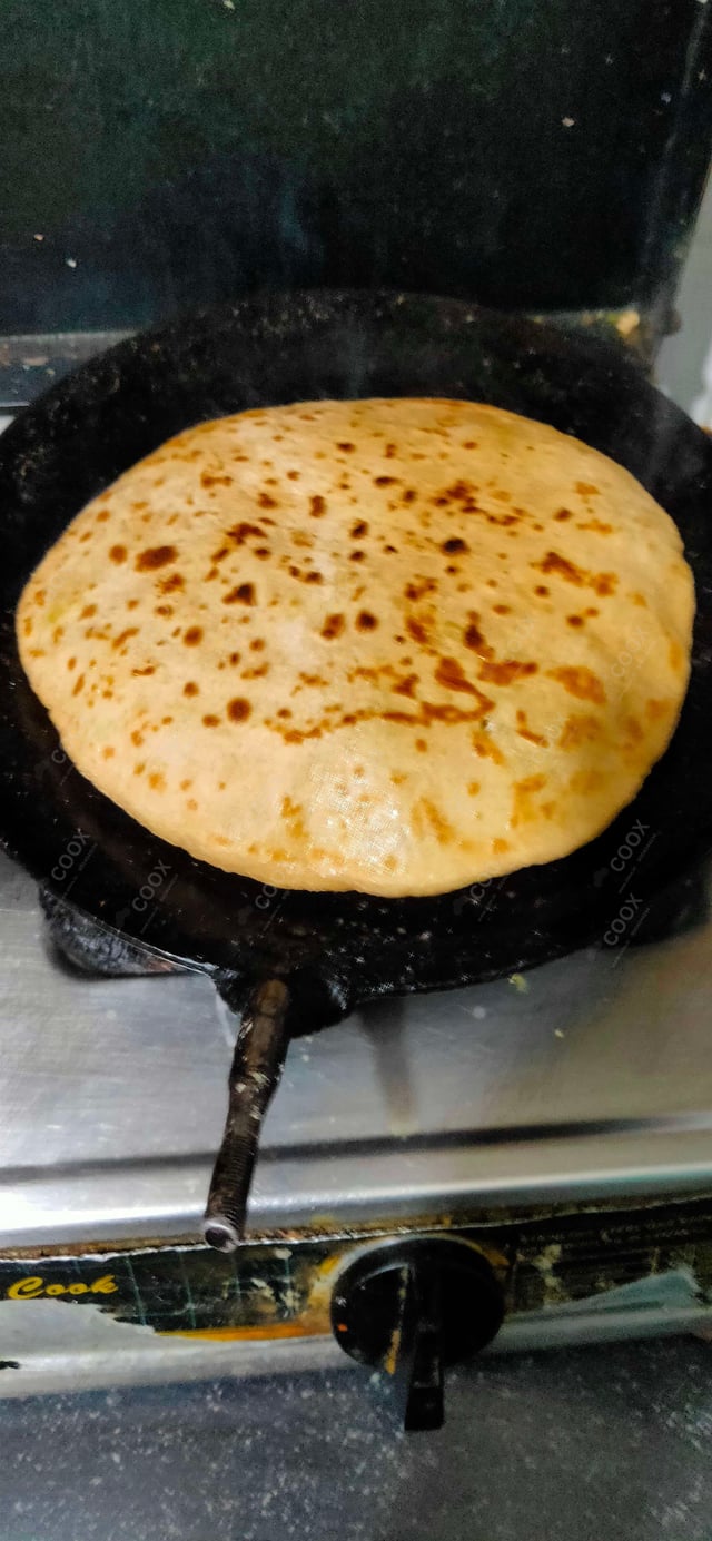 Delicious Lachha Parantha & Roti prepared by COOX