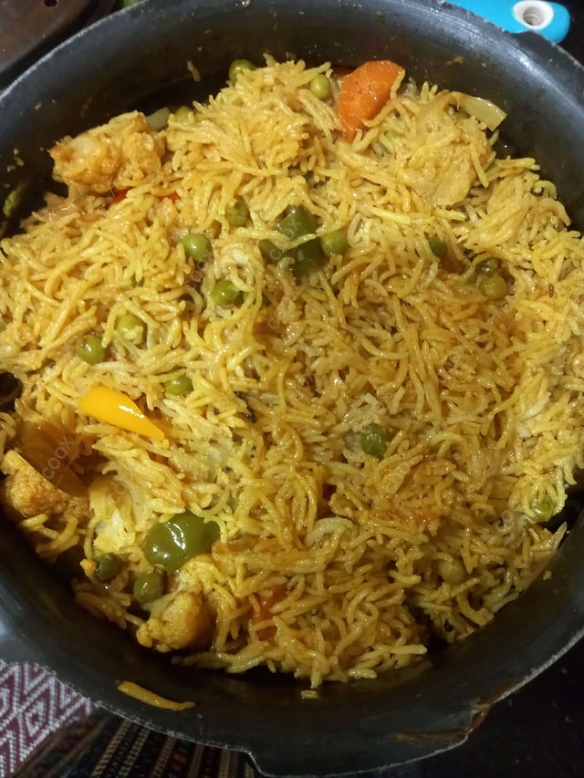 Delicious Veg Biryani prepared by COOX