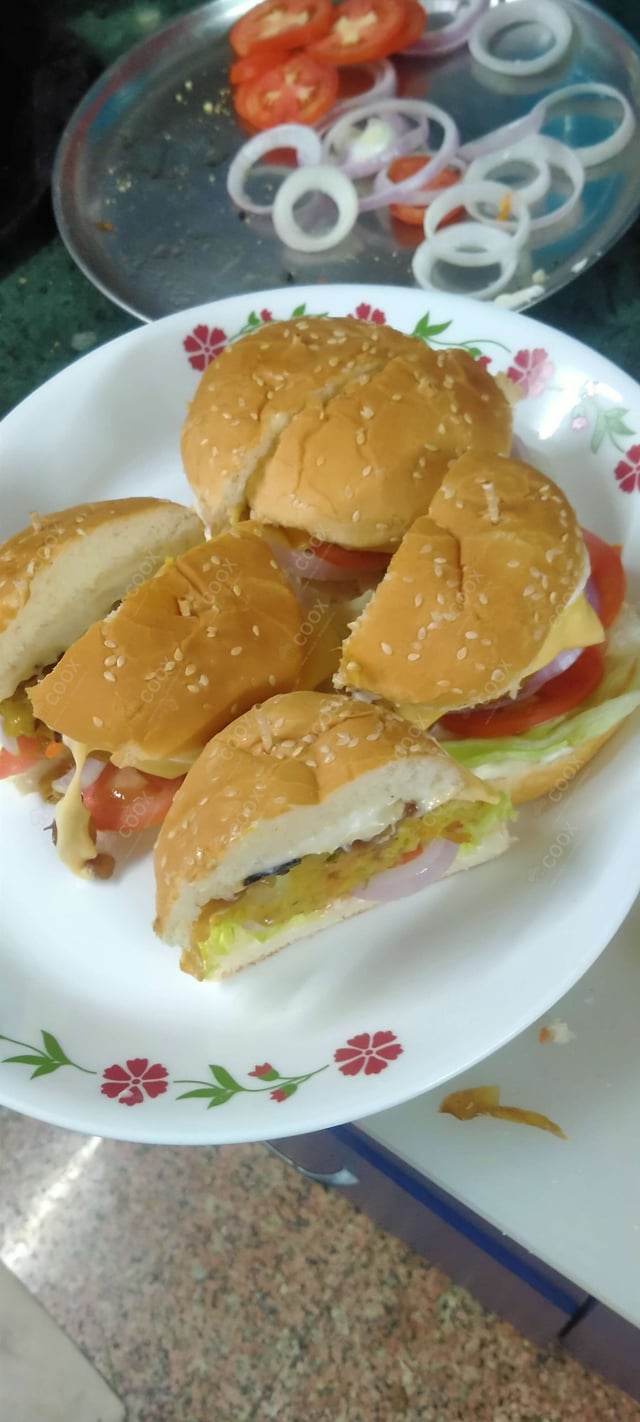 Delicious Mini Veg Burgers prepared by COOX