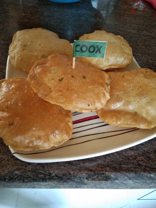 Delicious Poori & Bedmi prepared by COOX