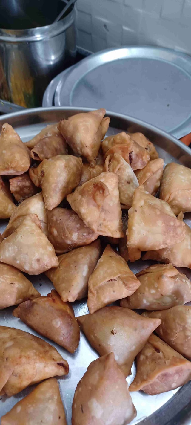 Delicious Mini Samosas prepared by COOX