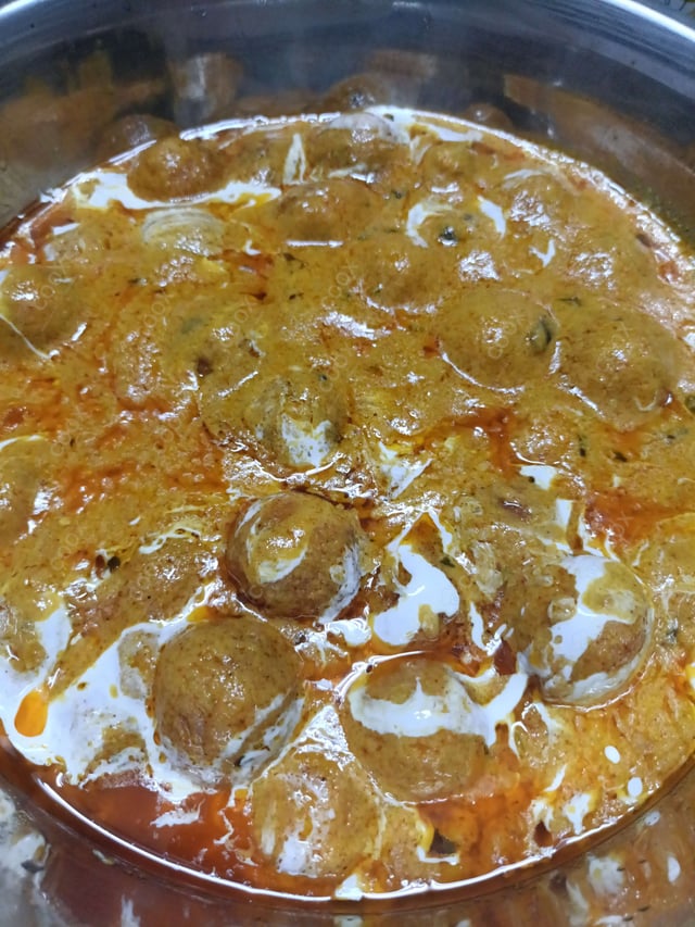 Delicious Malai Kofta (Orange Gravy) prepared by COOX