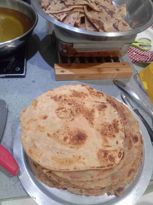 Delicious Lachha Paranthas prepared by COOX