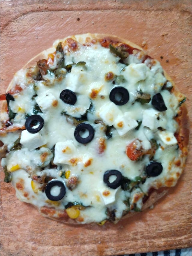 Delicious Veg Pizza prepared by COOX