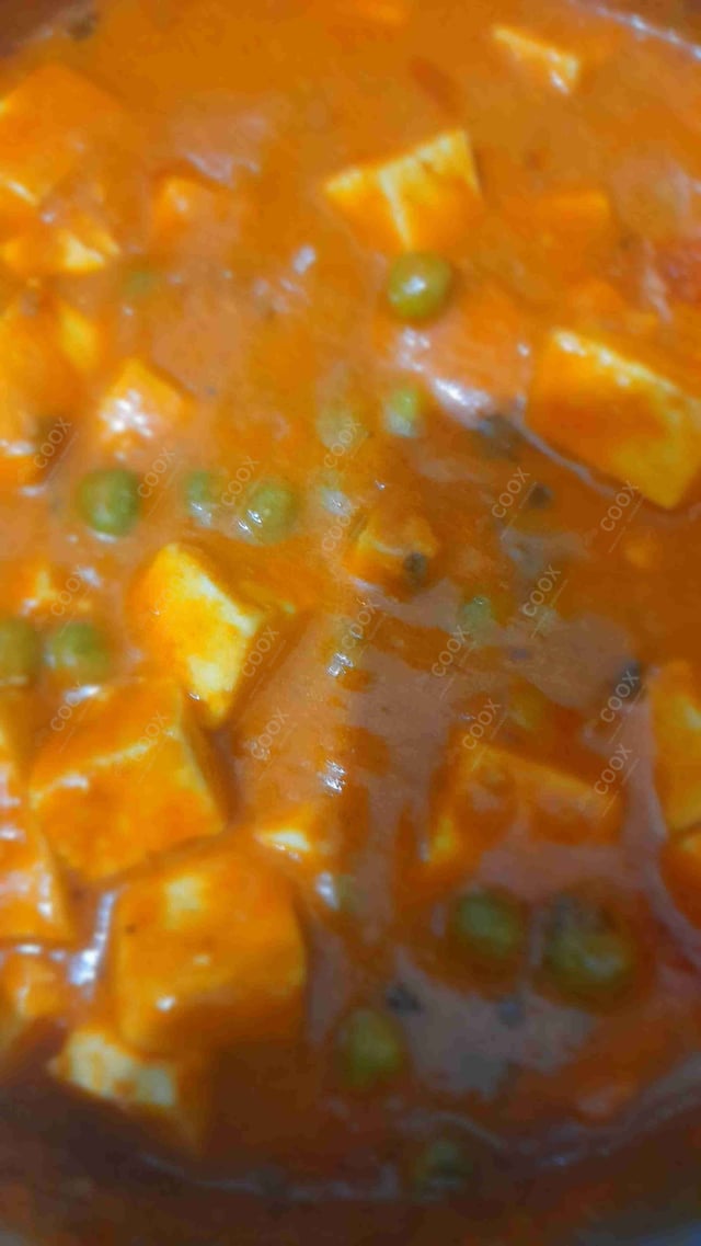 Delicious Matar Paneer prepared by COOX