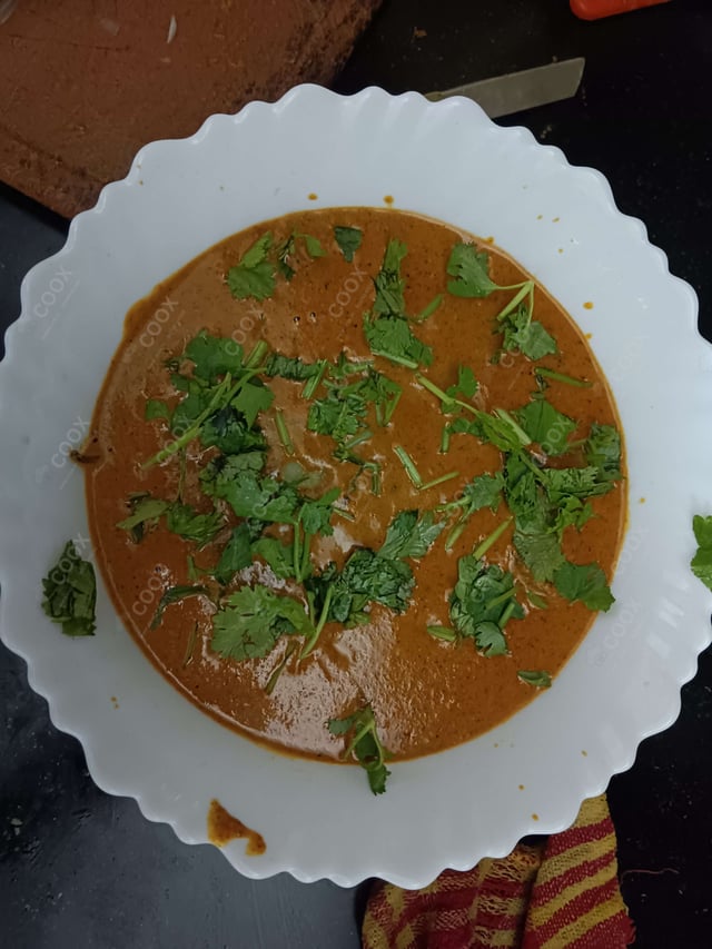 Delicious Malai Kofta (Orange Gravy) prepared by COOX