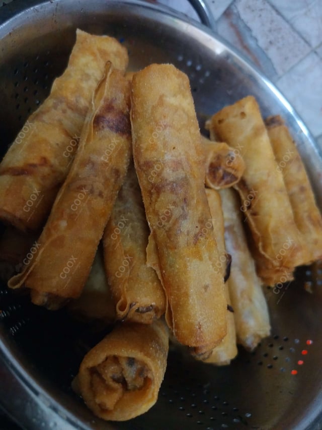 Delicious Chicken Spring Rolls prepared by COOX