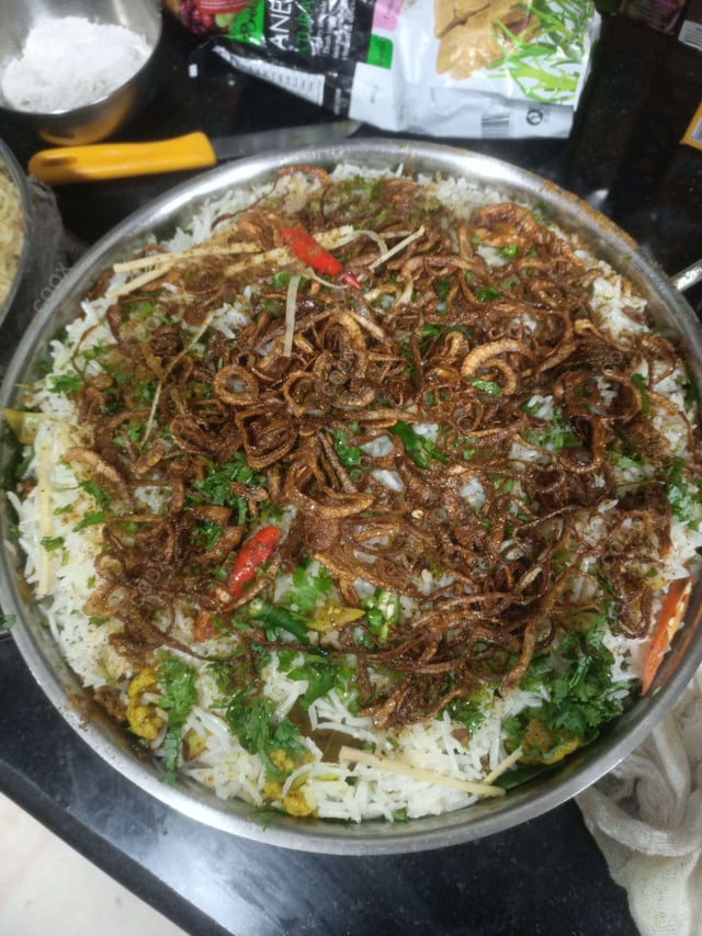 Delicious Veg Biryani prepared by COOX