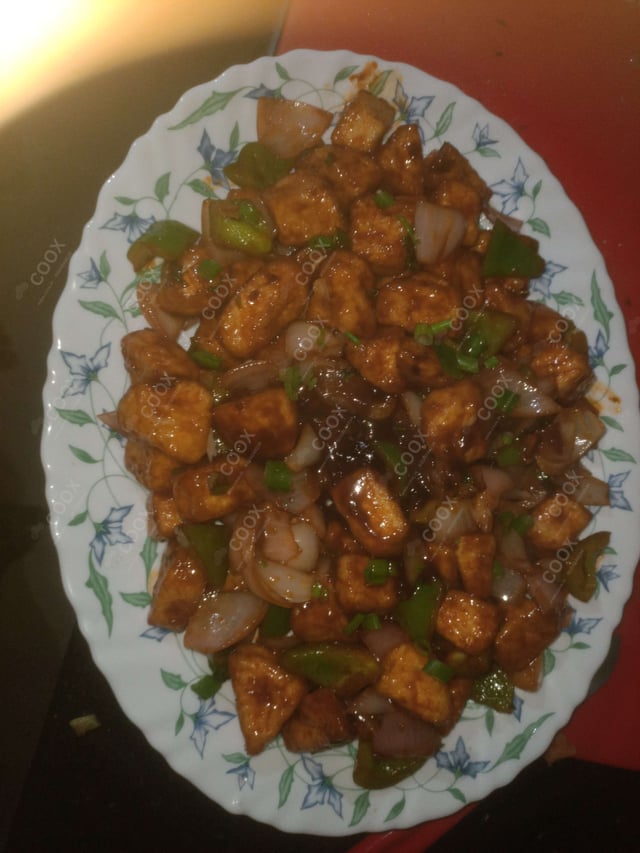 Delicious Chilli Paneer (Dry) prepared by COOX