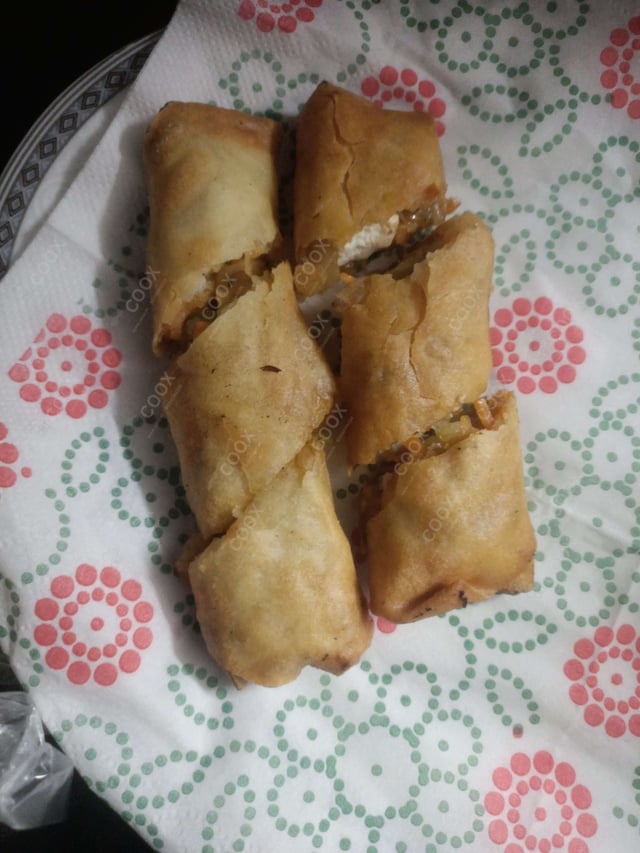 Delicious Veg Spring Rolls prepared by COOX