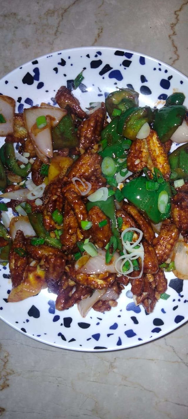 Delicious Crispy Chilli Baby Corn prepared by COOX