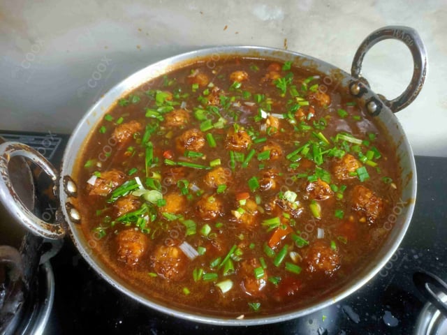 Delicious Veg Manchurian (Dry) prepared by COOX