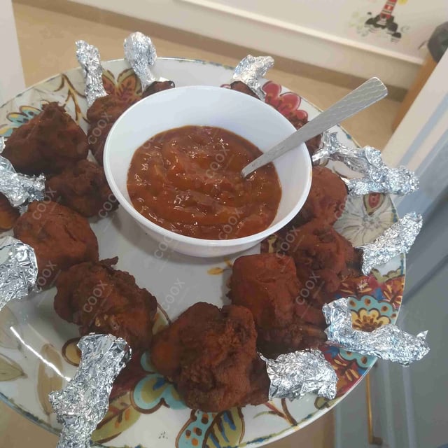 Delicious Chicken Lollipop prepared by COOX