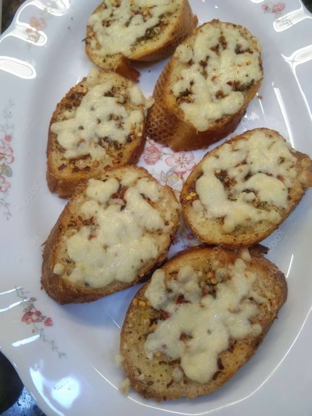 Delicious Garlic Bread with Cheese prepared by COOX