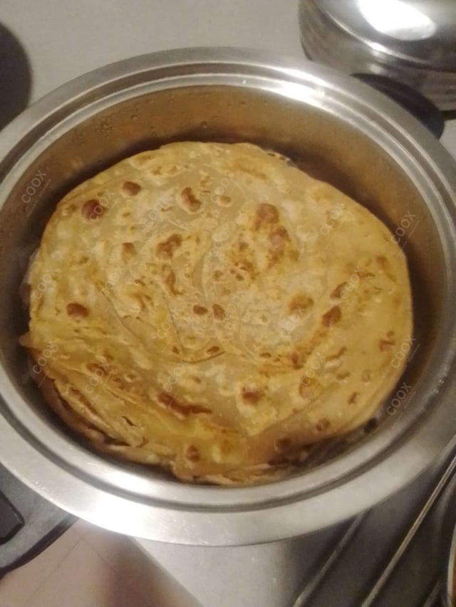 Delicious Lachha Parathas prepared by COOX