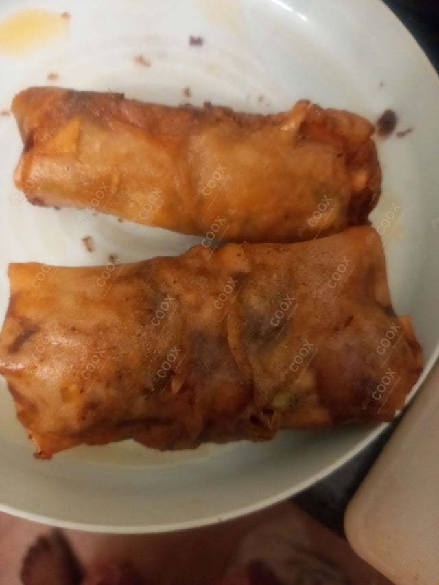 Delicious Veg Spring Rolls prepared by COOX