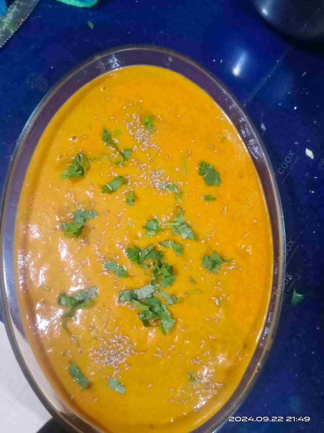 Delicious Malai Kofta (Orange Gravy) prepared by COOX