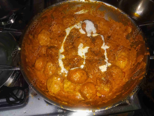 Delicious Dum Aloo prepared by COOX