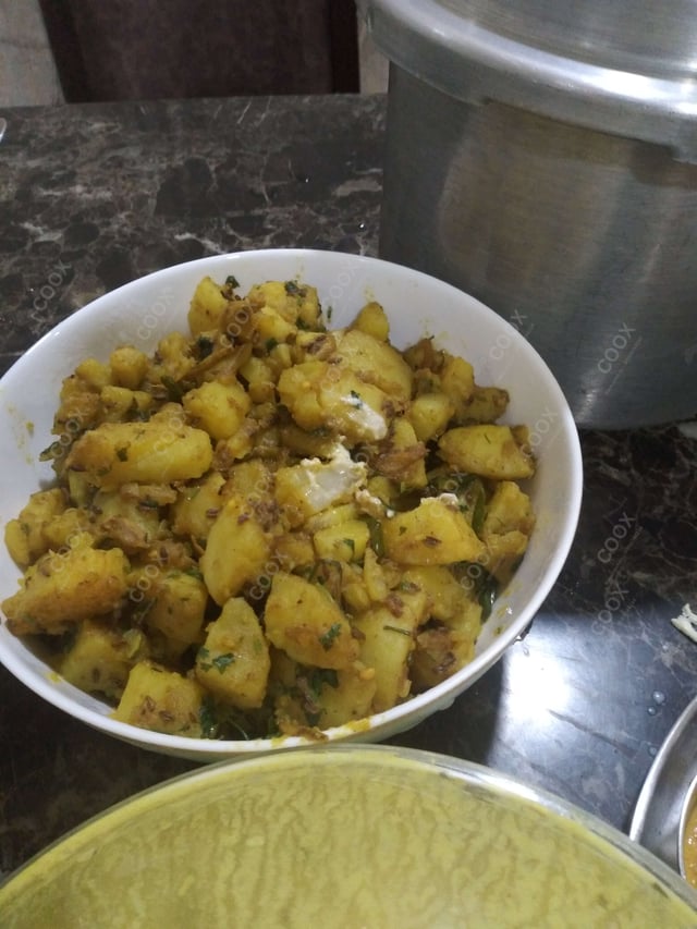 Delicious Jeera Aloo prepared by COOX