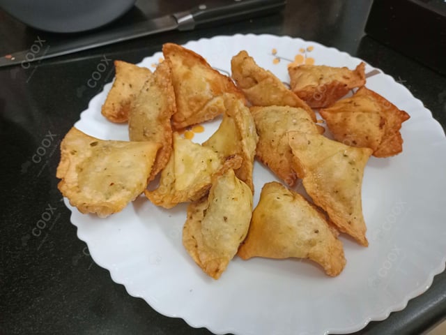 Delicious Mini Samosas prepared by COOX