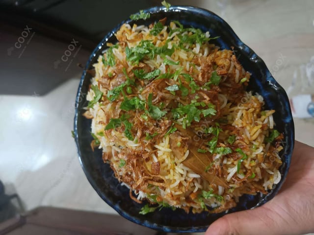 Delicious Veg Biryani prepared by COOX