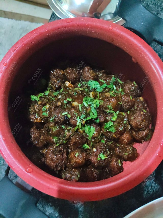 Delicious Veg Manchurian (Dry) prepared by COOX