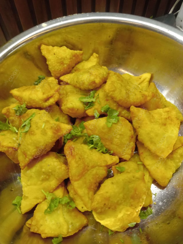 Delicious Mini Samosas prepared by COOX