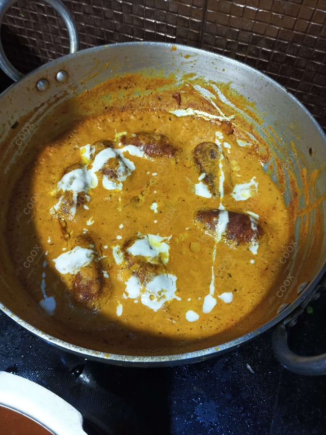 Delicious Malai Kofta (Orange Gravy) prepared by COOX