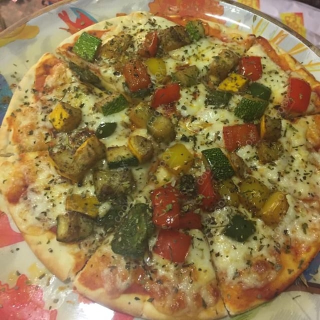 Delicious Classic Veggie Pizza prepared by COOX