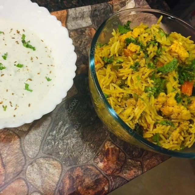 Delicious Veg Biryani prepared by COOX