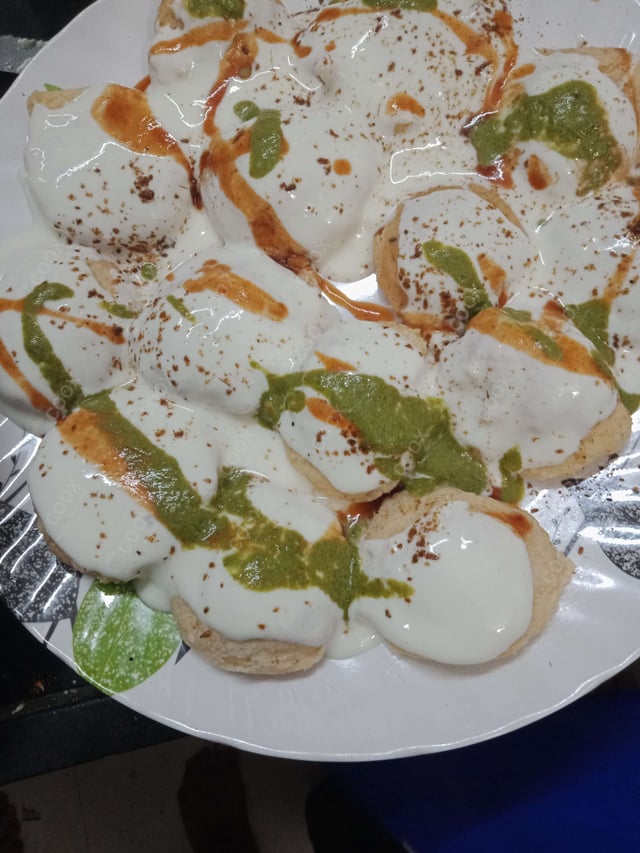 Delicious Dahi Bhalla prepared by COOX