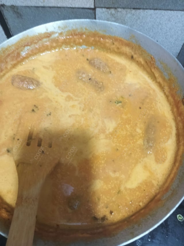 Delicious Malai Kofta (Orange Gravy) prepared by COOX