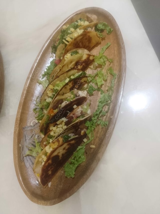 Delicious Grilled Chicken Taco prepared by COOX