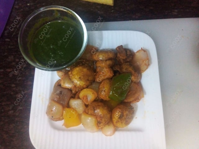 Delicious Mushroom Tikka prepared by COOX