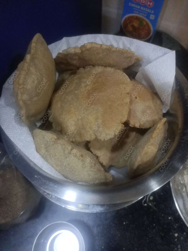 Delicious Kuttu ki Pooris prepared by COOX