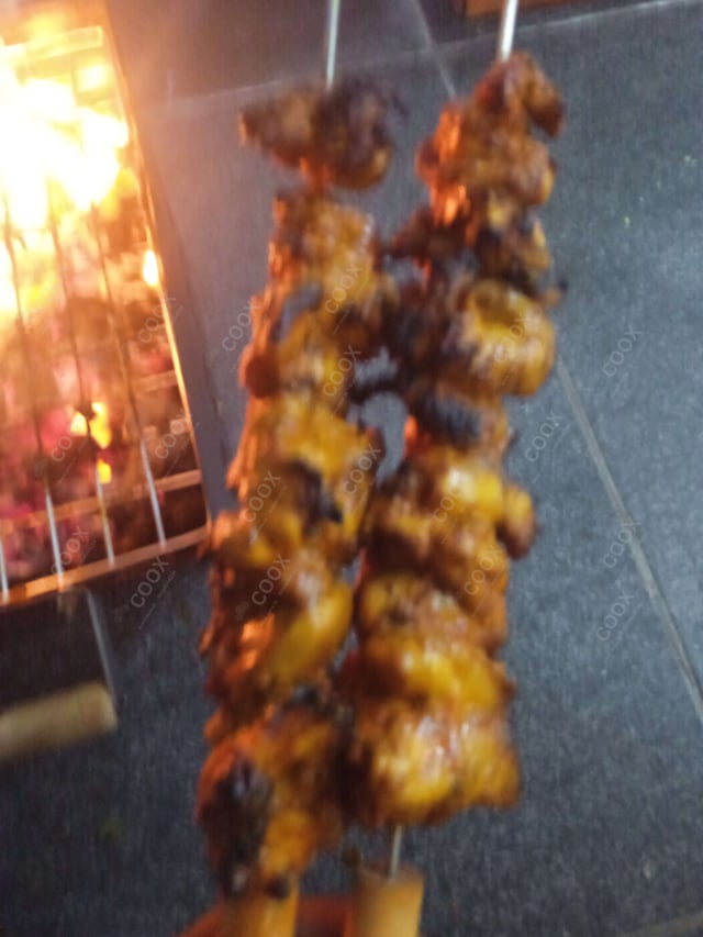 Delicious Tandoori Chicken prepared by COOX