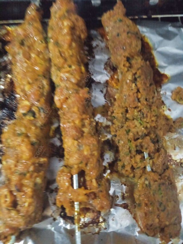 Delicious Mutton Seekh Kebab prepared by COOX