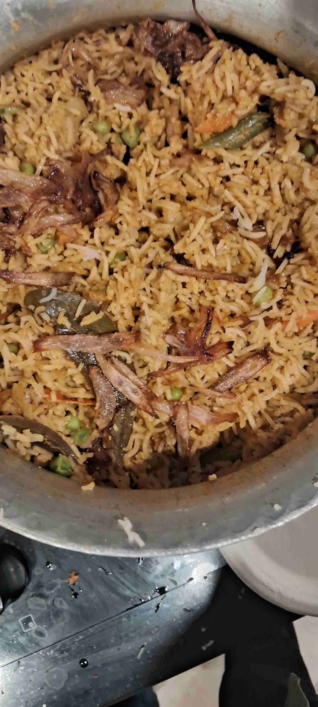 Delicious Veg Biryani prepared by COOX