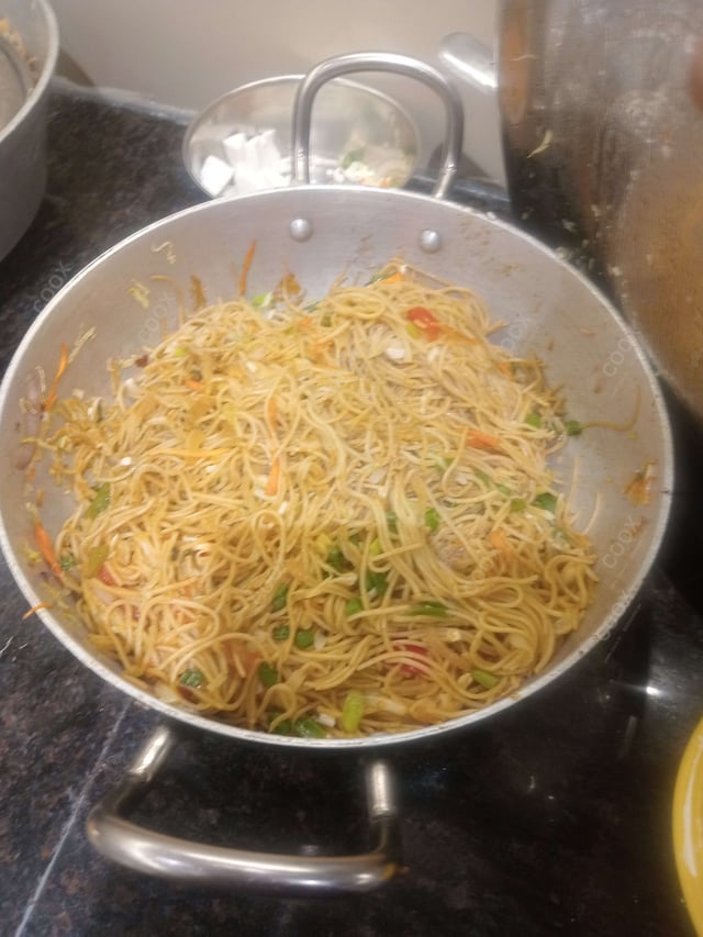 Delicious Veg Hakka Noodles prepared by COOX