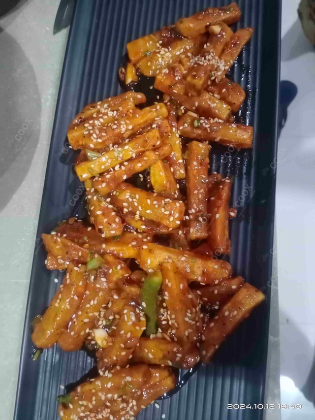 Delicious Honey Chilli Potato prepared by COOX