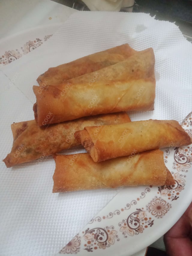 Delicious Veg Spring Rolls prepared by COOX