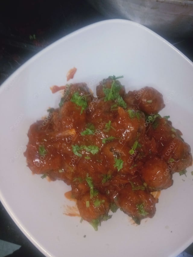 Delicious Veg Manchurian (Dry) prepared by COOX