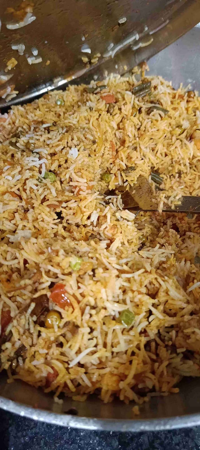 Delicious Veg Biryani prepared by COOX