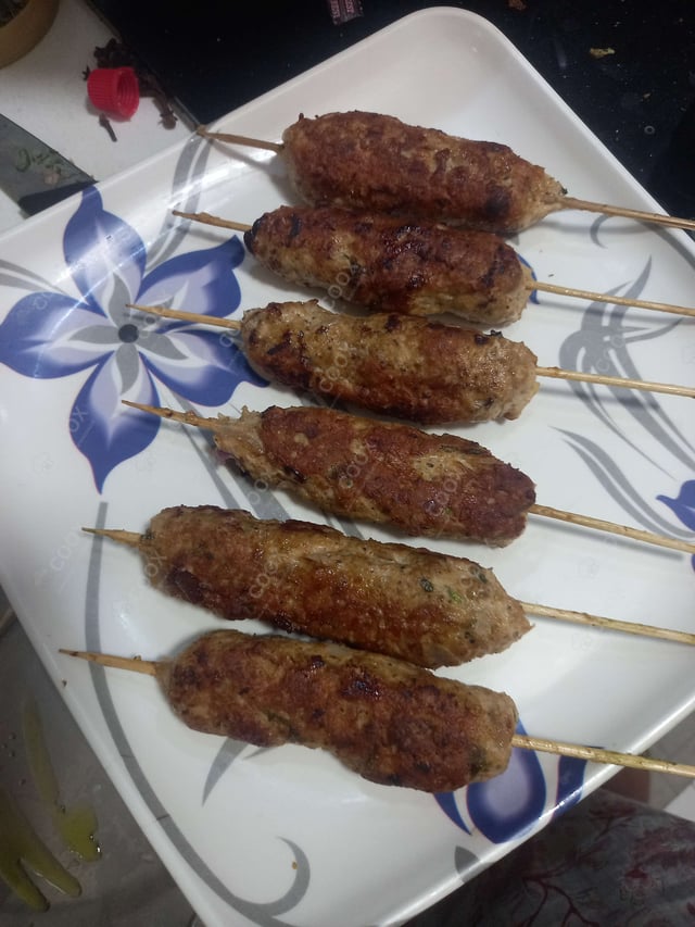 Delicious Chicken Seekh Kebab prepared by COOX