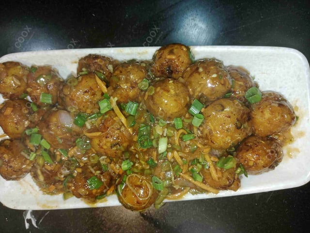 Delicious Veg Manchurian (Dry) prepared by COOX