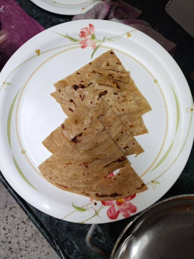 Delicious Lachha Parathas prepared by COOX