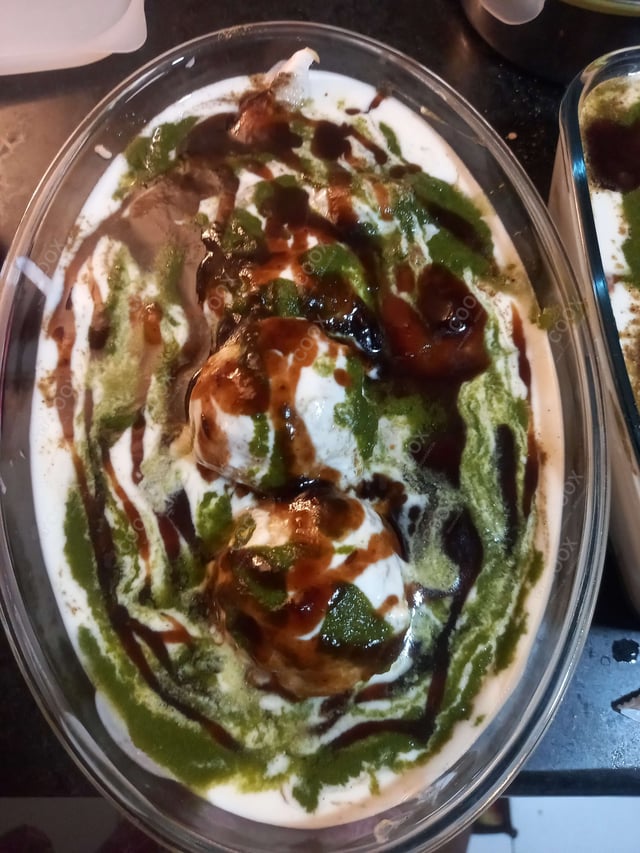 Delicious Dahi Bhalla prepared by COOX