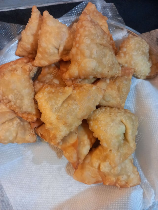 Delicious Mini Samosas prepared by COOX