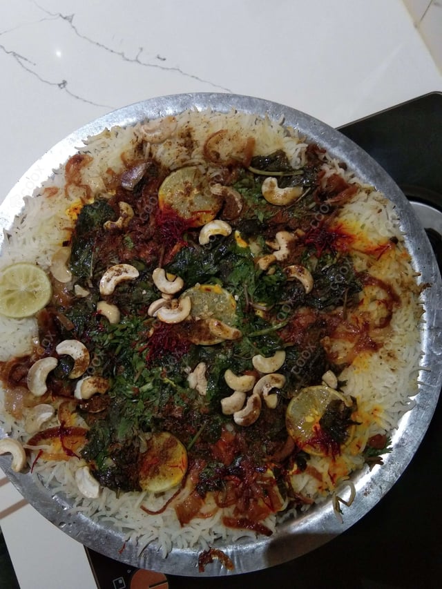 Delicious Veg Biryani prepared by COOX